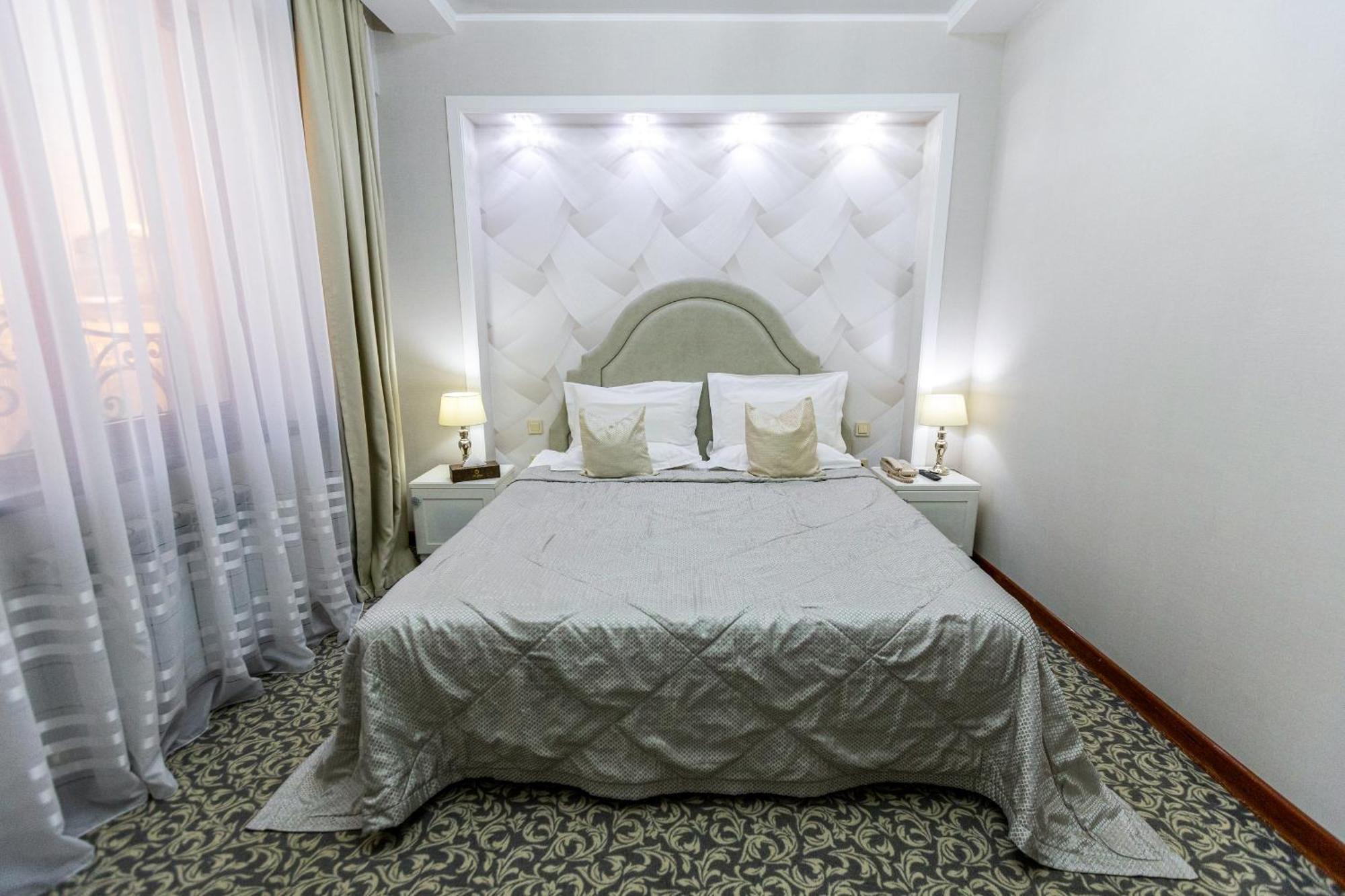 Plaza Hotel Almaty Quarto foto