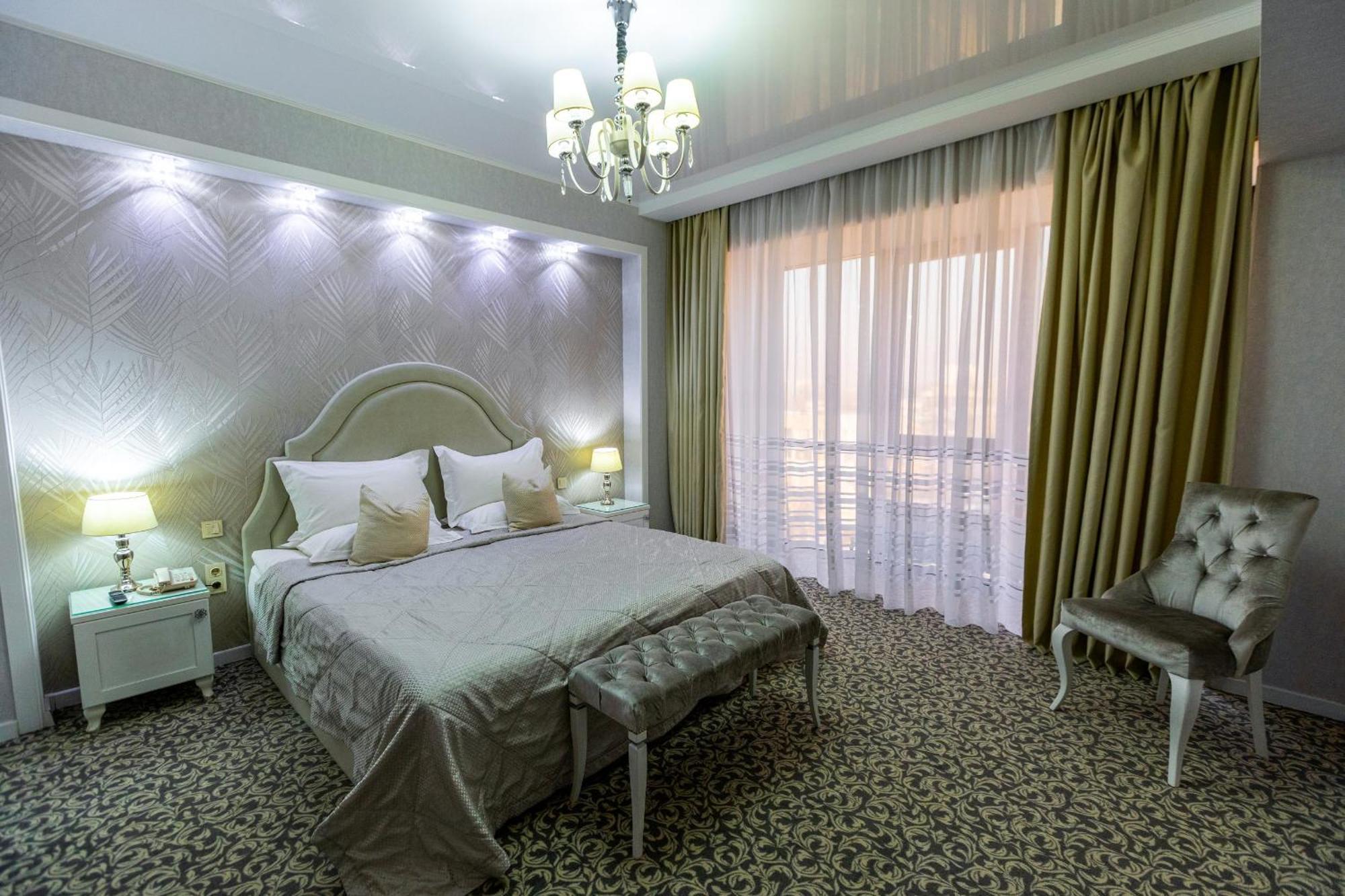Plaza Hotel Almaty Quarto foto